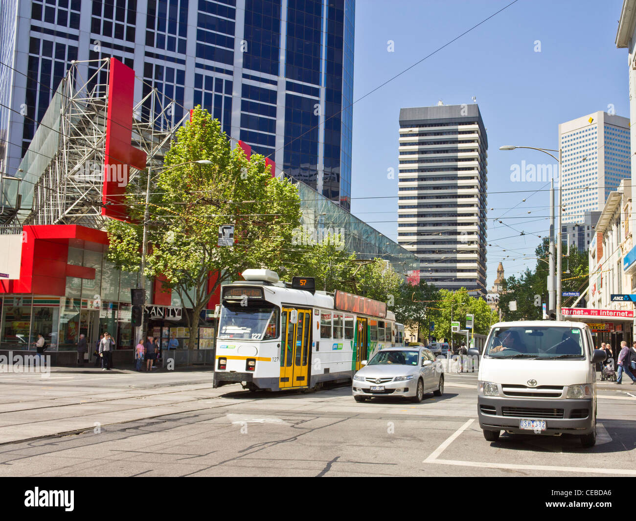 Tram and cars crossing at intersection of La Trobe and Elizabeth Streets, Melbourne, Victoria, Australia Stock Photo