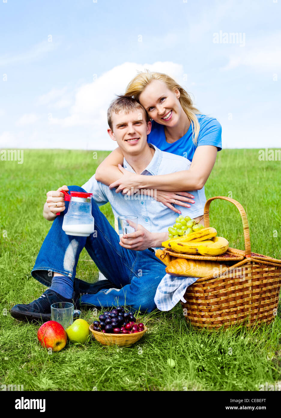 Family having a picnic on grass hi-res stock photography and images - Alamy