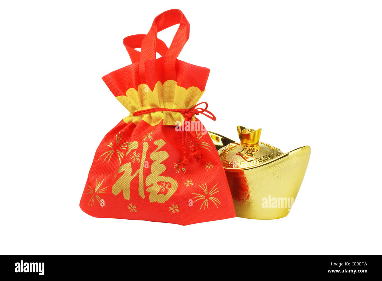 Chinese New Year Gift Bag and Gold ingot Ornament on White Background Stock Photo