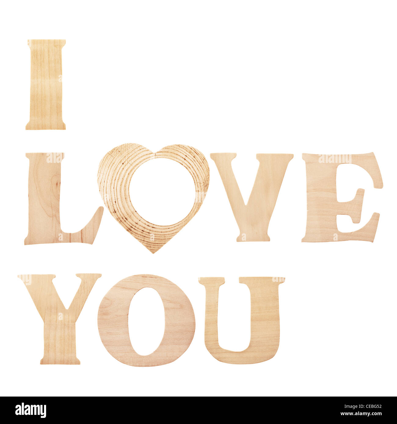 Words 'I Love You' made of wooden textured letters, 'o' in shape of a heart, isolated over white background Stock Photo