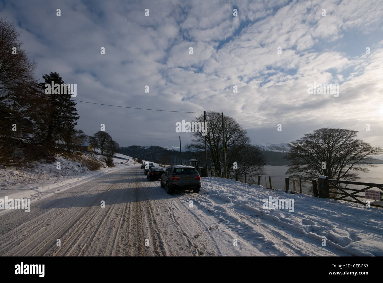 Snow covered A57 Snake Pass at Ladybower Reservoir in the Peak District