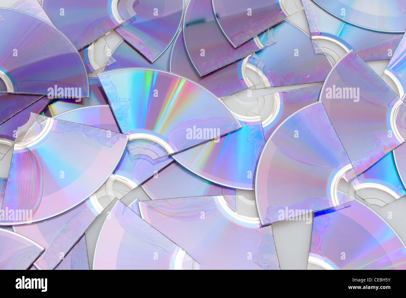 Background of Pieces of Broken CD Compact Discs Stock Photo