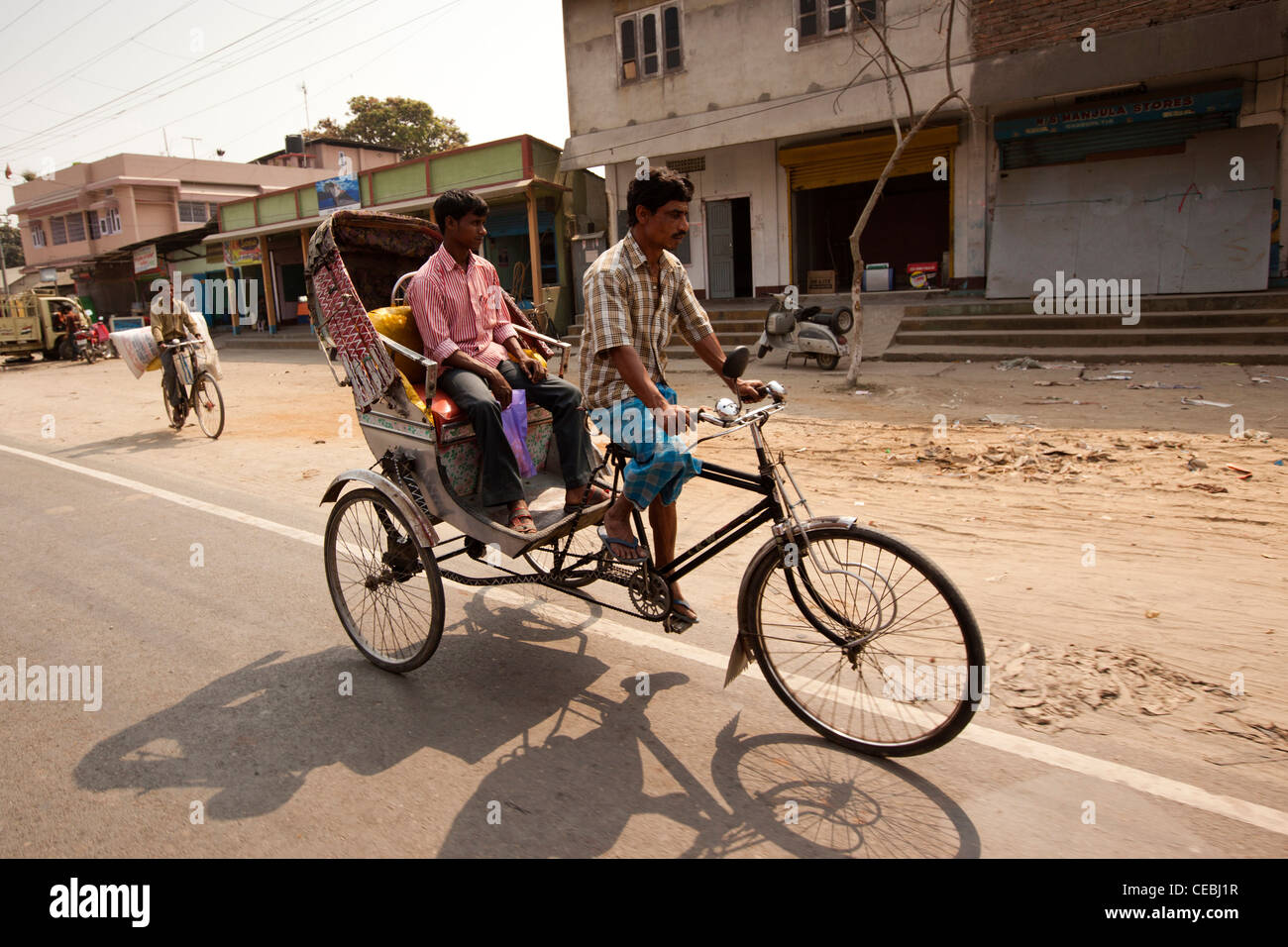 India, Assam, Tezpur, transport, male passenger carried, in cycle rickshaw Stock Photo