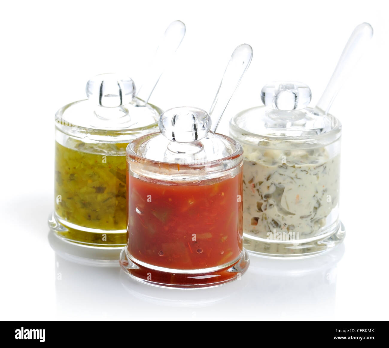 Various Dips In Glass Jars On White Background Stock Photo Alamy