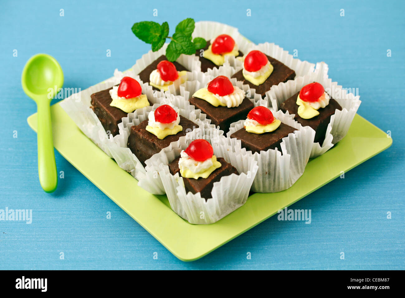 Little chocolate sponge cakes. Recipe available. Stock Photo