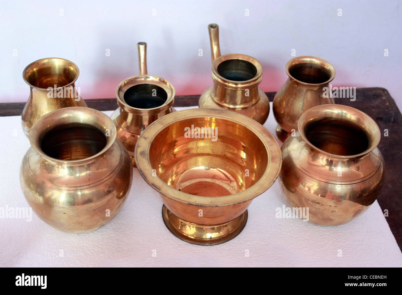 Metal bronze vessels used in Ayurveda treatment in India Stock Photo