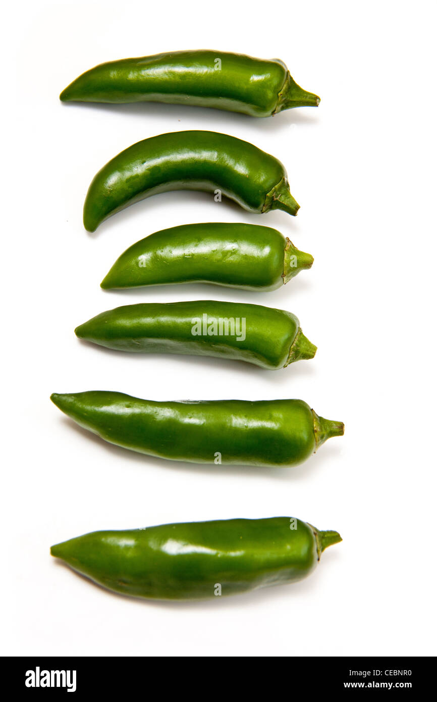 Green chili peppers isolated on a white studio background Stock Photo ...