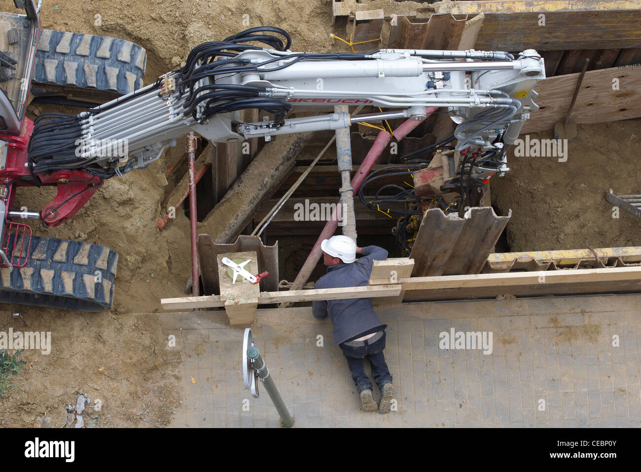 construction workers doing road works Stock Photo - Alamy