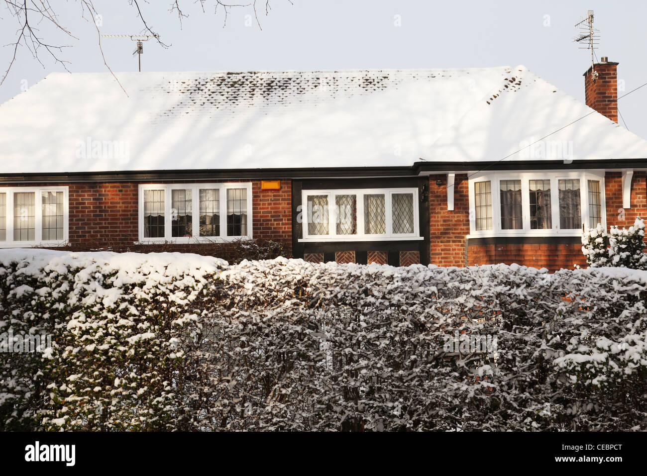 A snow covered roof on a house in Nottingham, England, U.K. Stock Photo