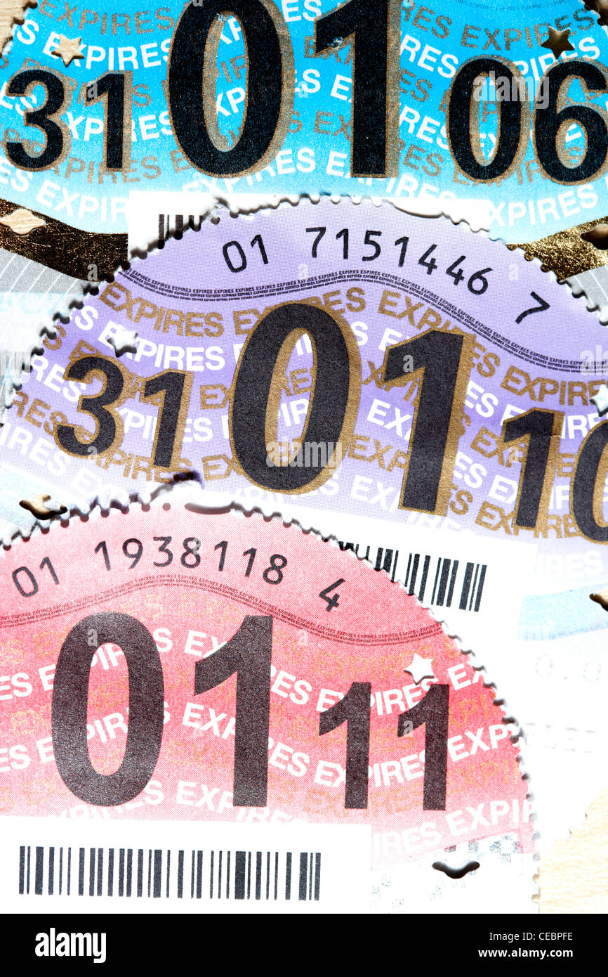 selection of uk vehicle road fund licenses tax discs Stock Photo