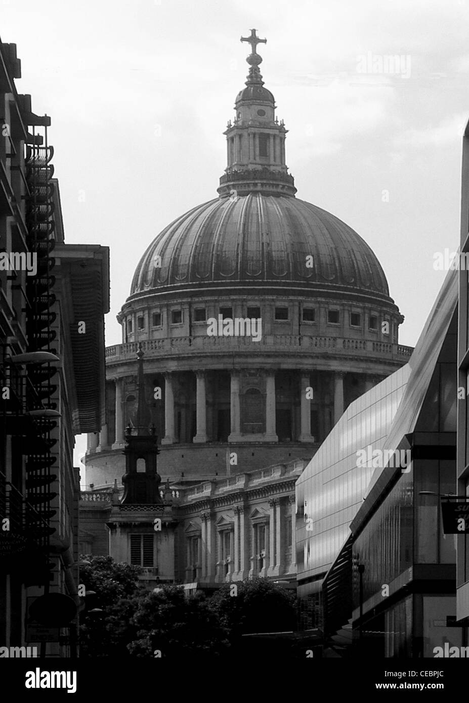St Paul's cathedral dome, London - seen from Watling Street in Black & White Stock Photo