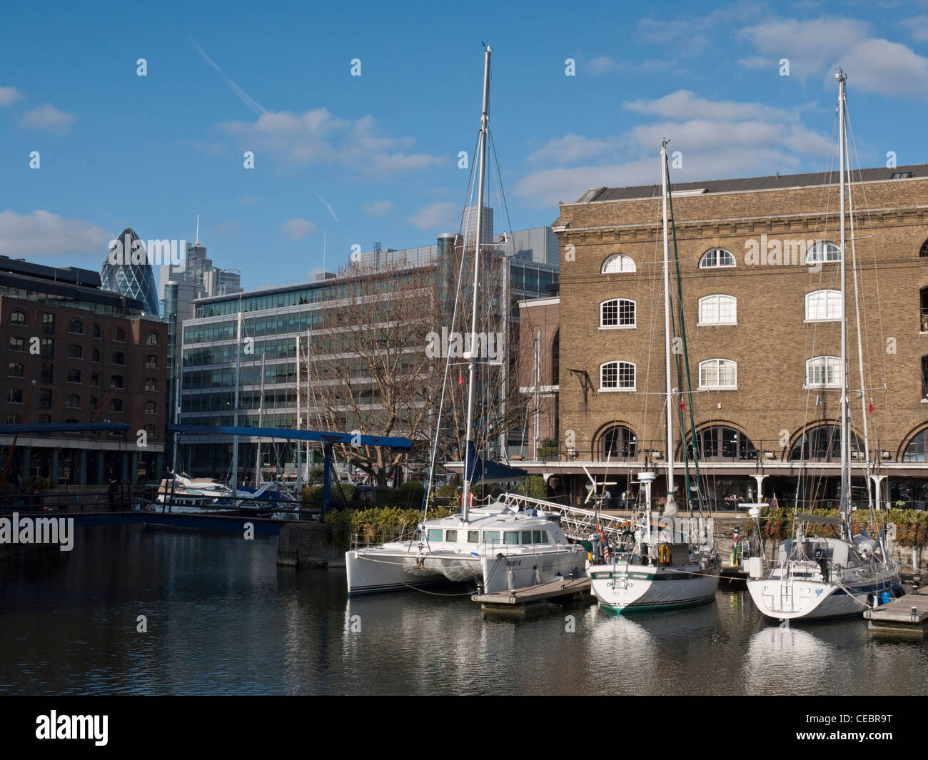 Boats and apartments at St. Katherine Dock, London, England Stock Photo