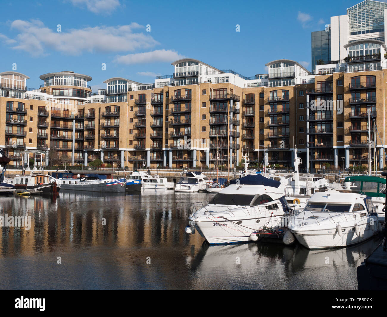 Boats and apartments at St. Katherine Dock, London, England Stock Photo