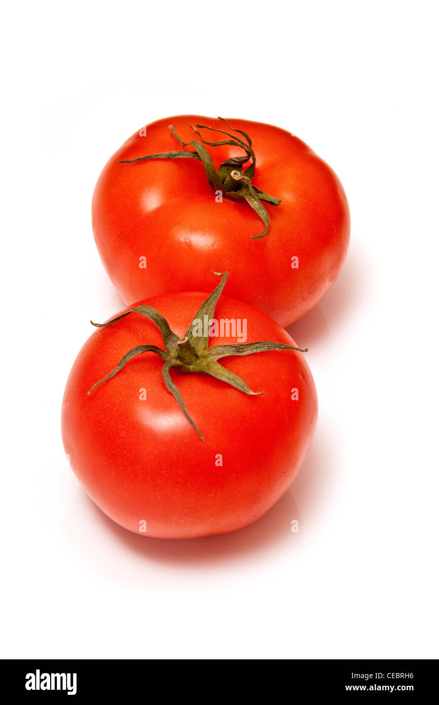 Beef Tomato's isolated on a white studio background. Stock Photo