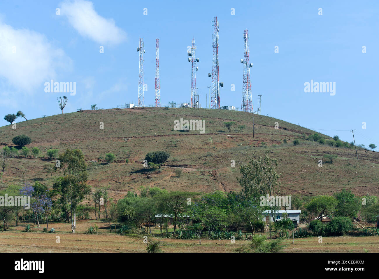 Telecommunication towers and small holder farm in a rural area, Arusha, Tanzania Stock Photo