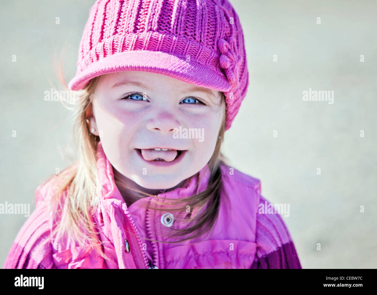 Happy girl wearing pink hat outdoor portrait Stock Photo Alamy