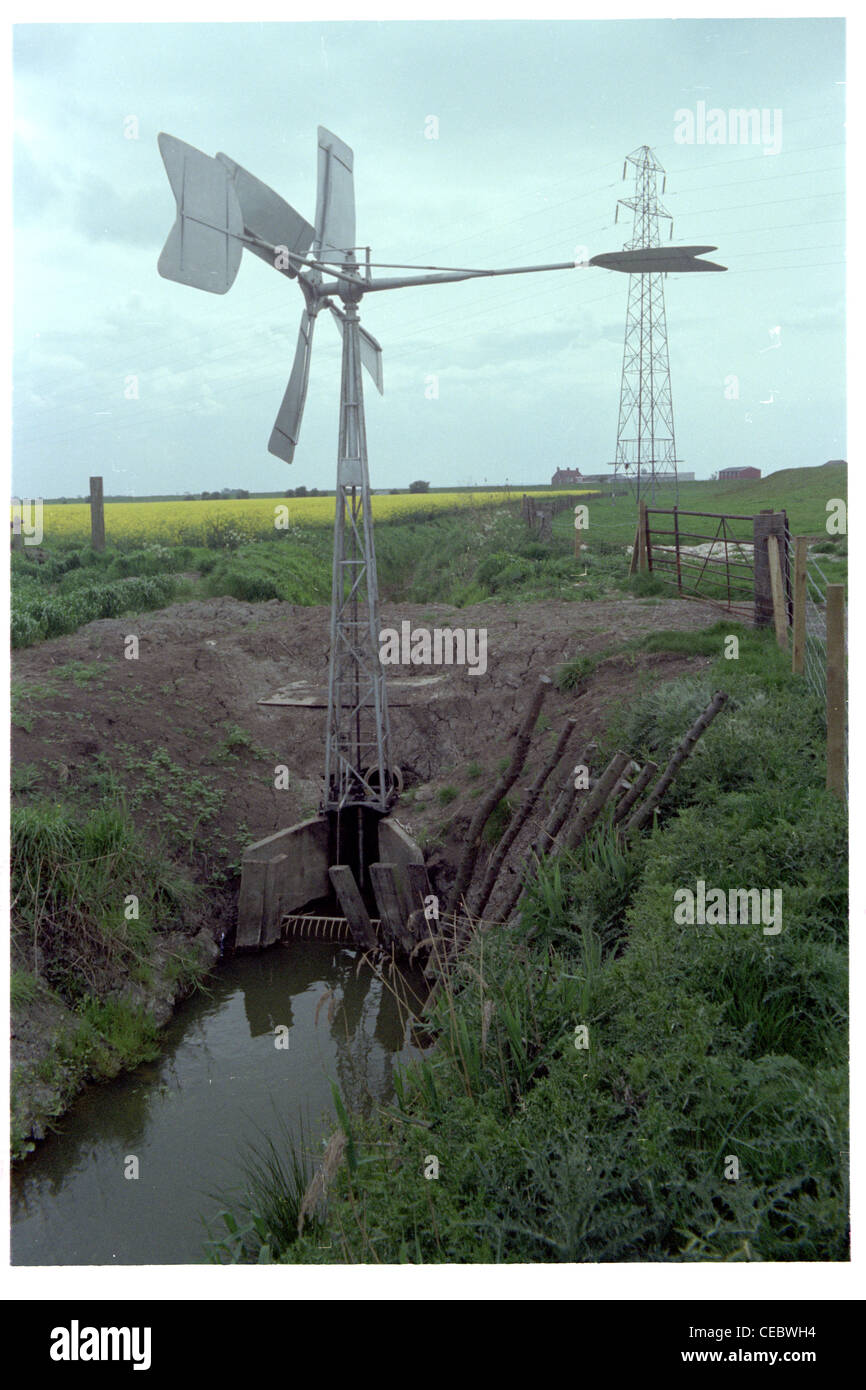 wind driven land drainage pump from Holland as installed in a dyke on