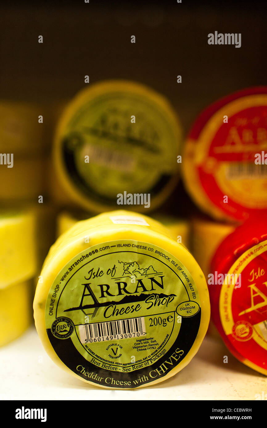 Local cheeses on display for sale at the Isle of Arran Distillery in Lochranza on the island of Arran. Stock Photo