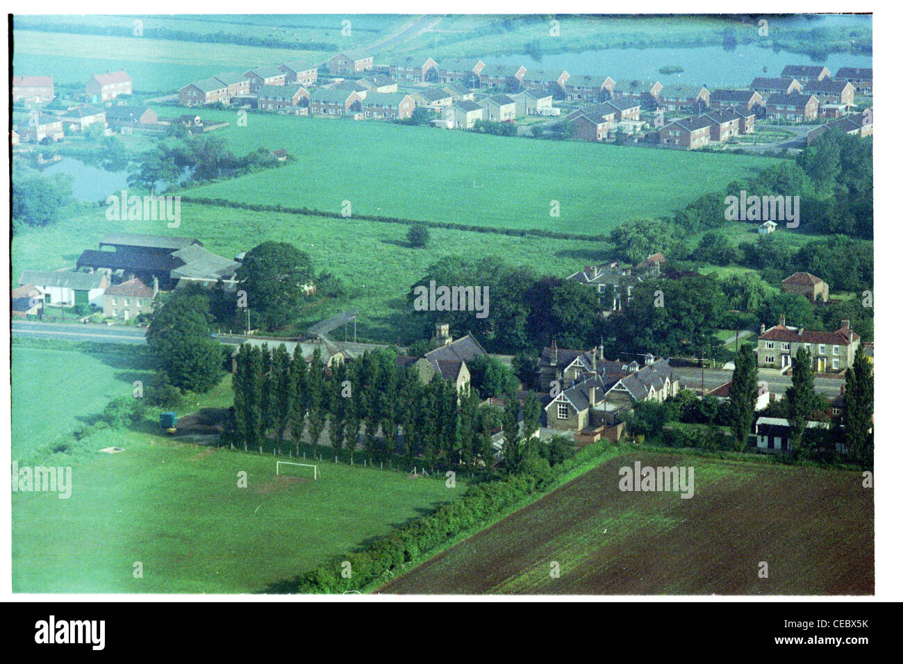 Oblique aerial view at an altitude of 1500ft of part of the village of