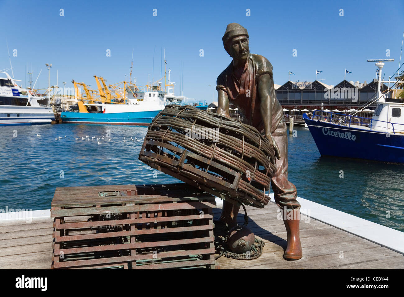 Sculpture of a lobster fisherman at Fishing Boat Harbour. Fremantle