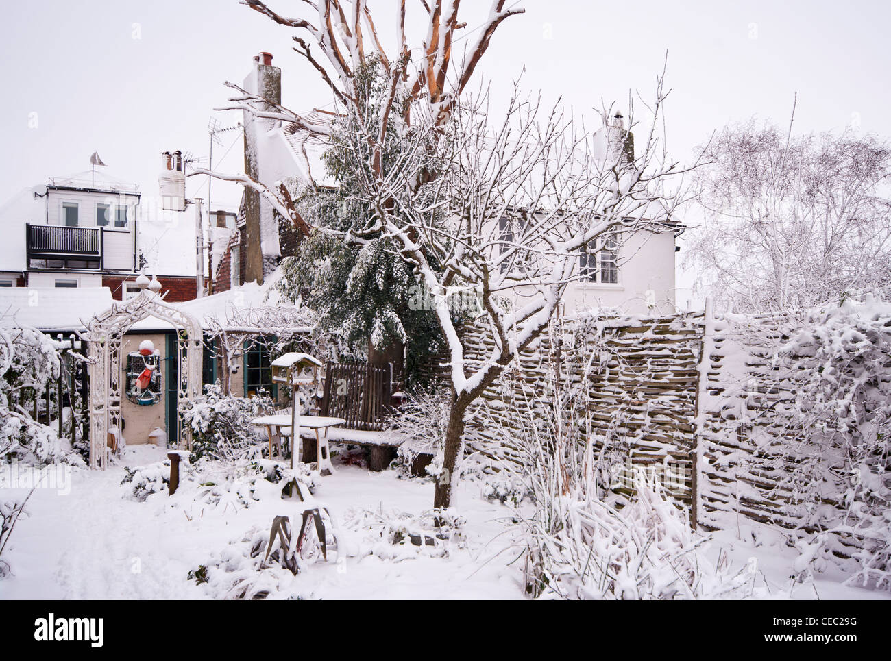 Winter Snow Covered Country Cottage House After A Heavy Snowfall UK Stock Photo