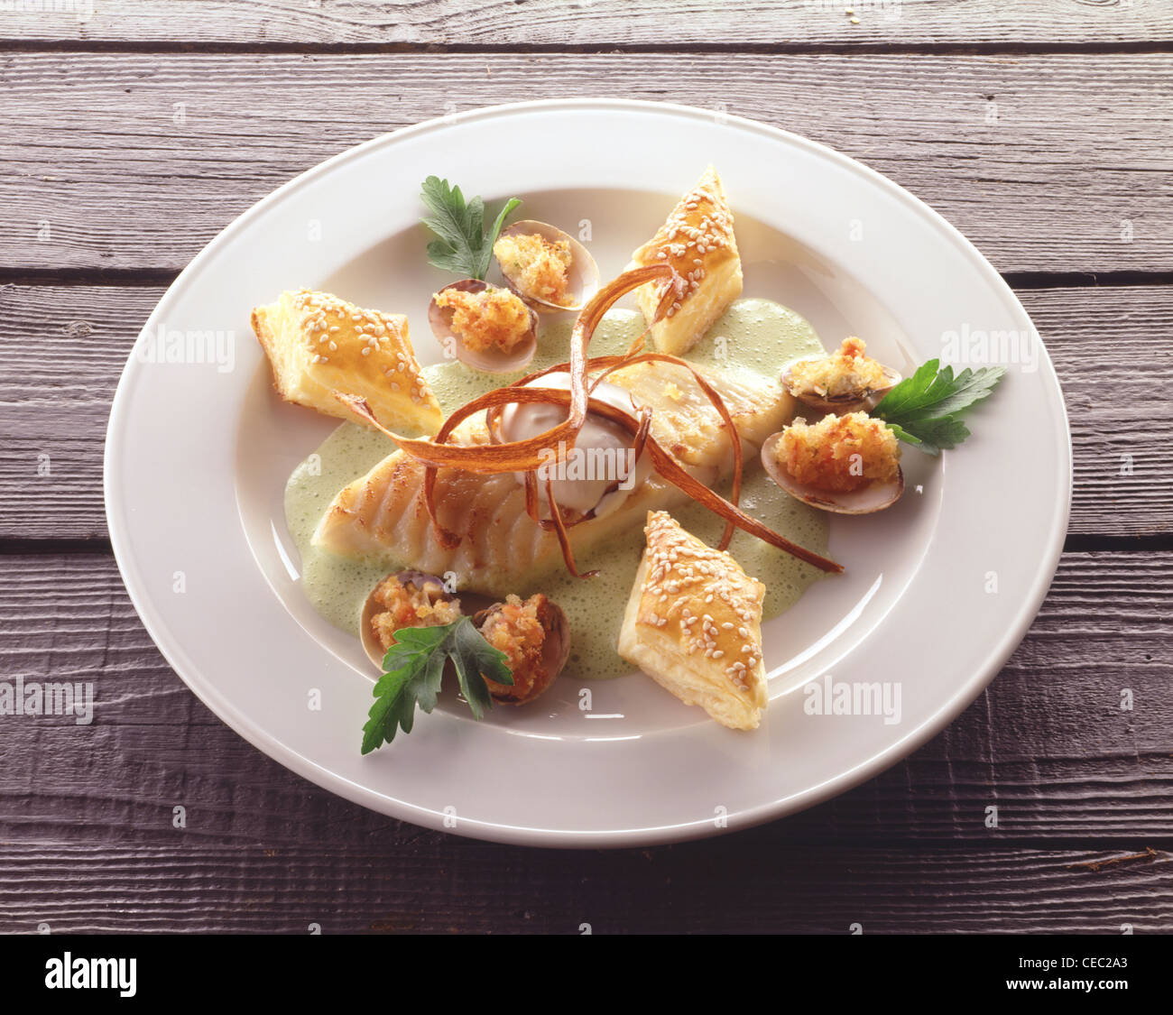 Turbot with clam shells au gratin Stock Photo Alamy