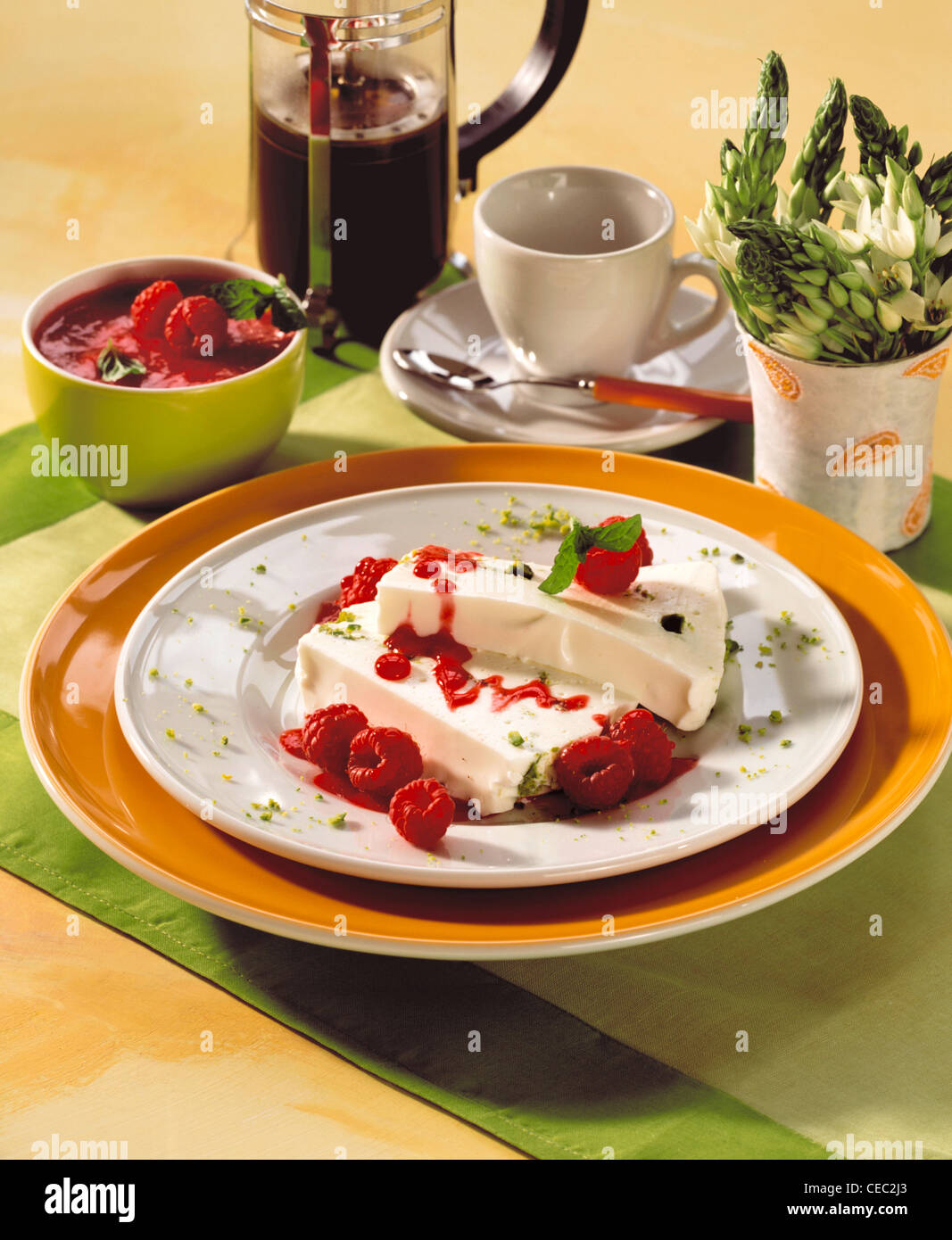 Mashed Raspberries Yoghurt pistachio terrine with mashed raspberries Stock Photo - Alamy
