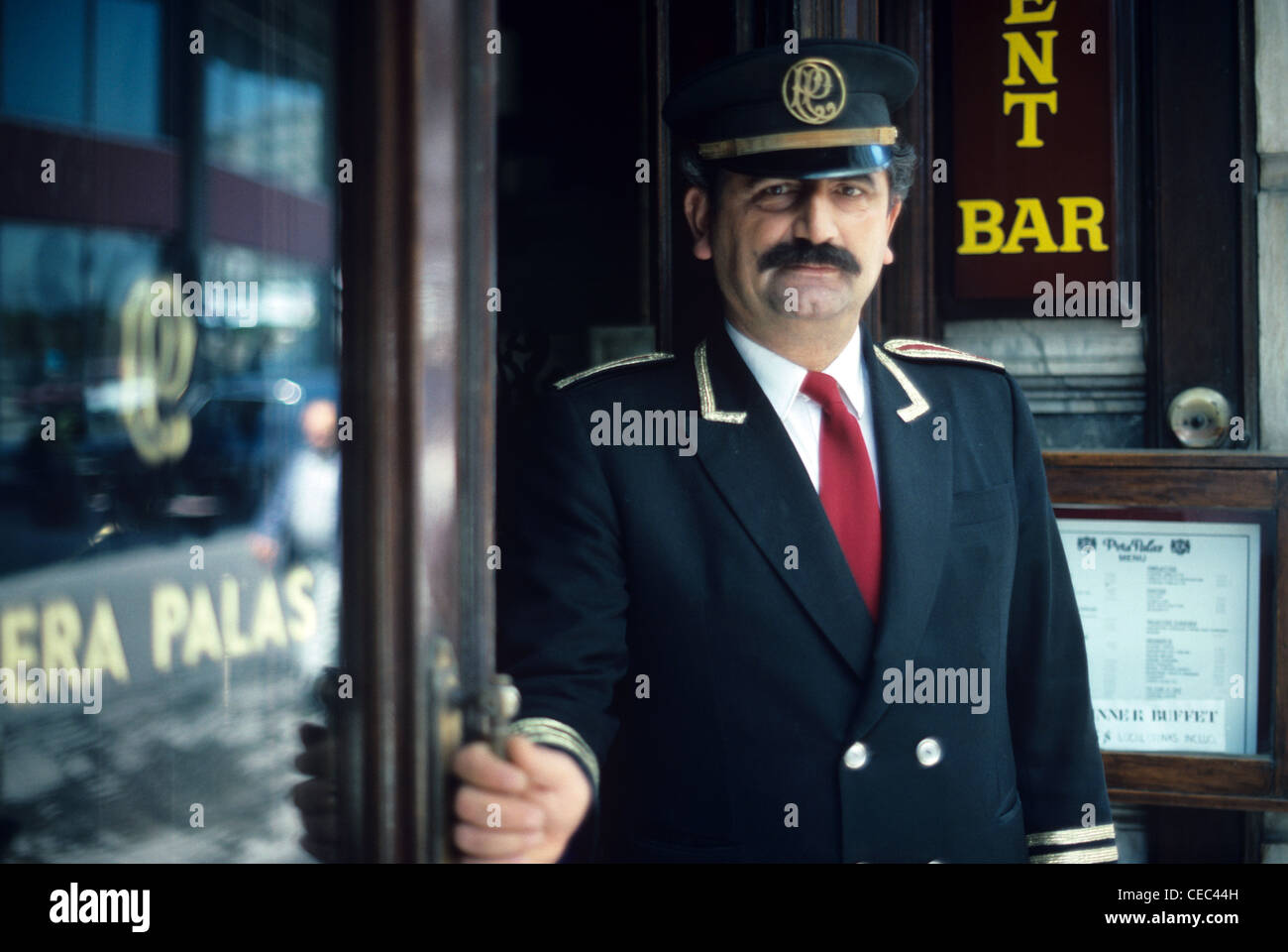 Turkish Doorman or Hall Porter at the Pera Palas or Pera Palace Hotel, Restaurant and Bar, Istanbul, Turkey Stock Photo
