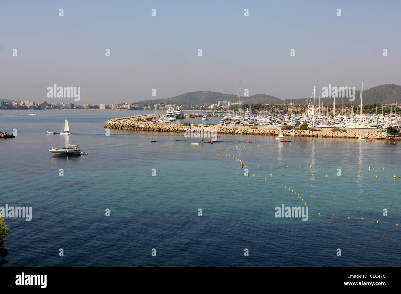 Scene looking westwards - with leisure craft and sailing school - over Puerto Portals Marina, Calvia, Mallorca / Majorca Stock Photo