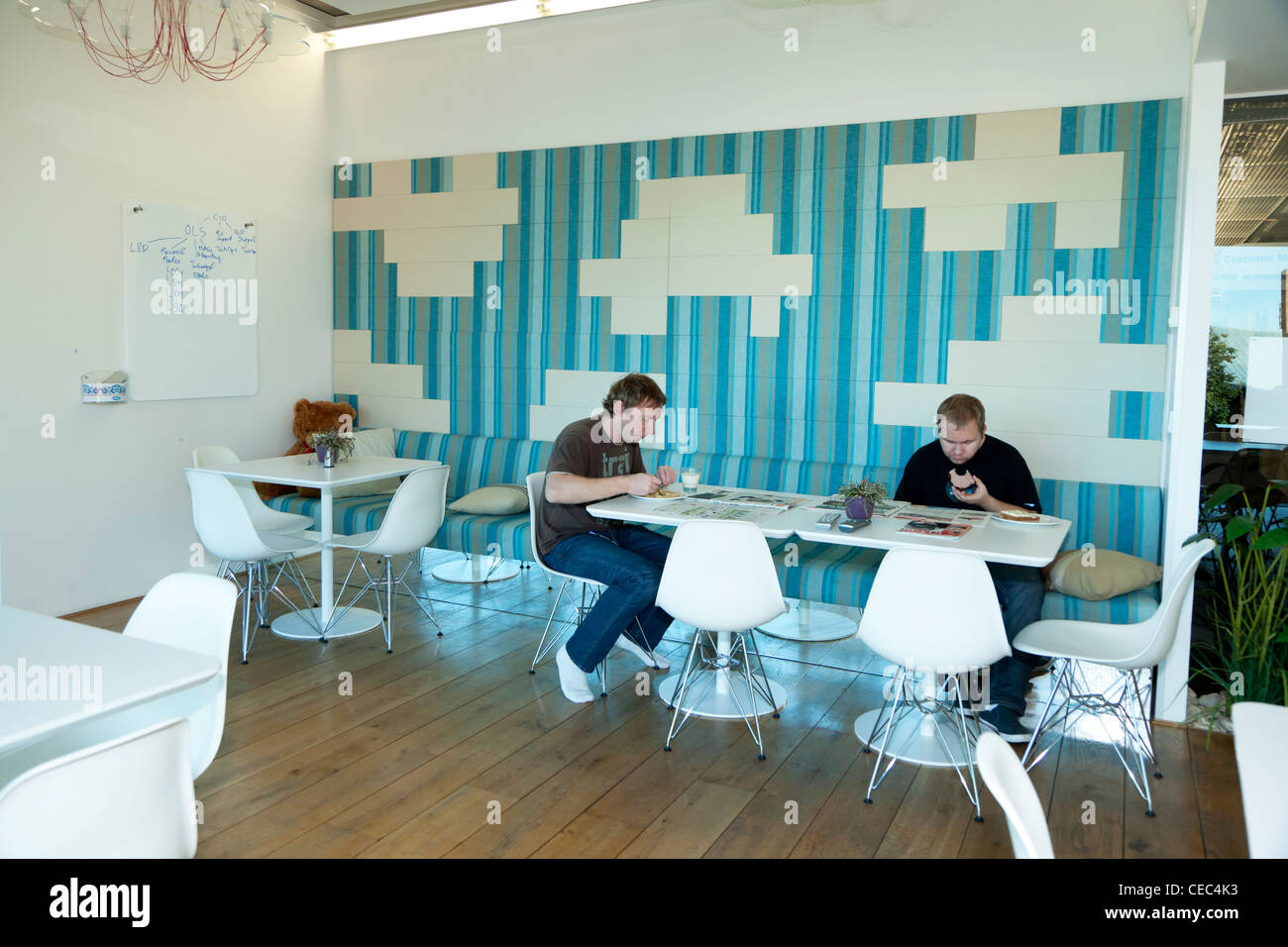 Employees in a cafeteria at the Skype Worldwide Headquarters, Tallinn, Estonia Stock Photo