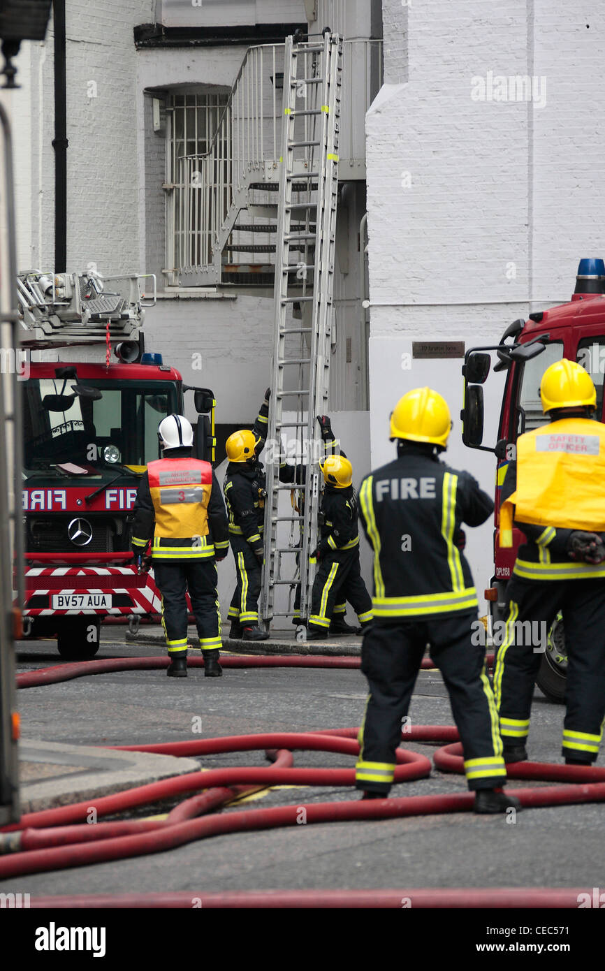 Firefighters at Grafton Street Mayfair as 100 fireman tackle a major ...