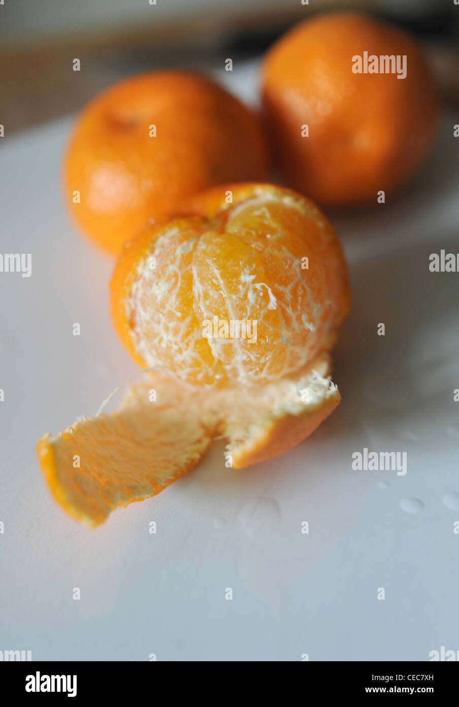 Peeled skin off a satsuma fruit rich in vitamin C for good health Stock