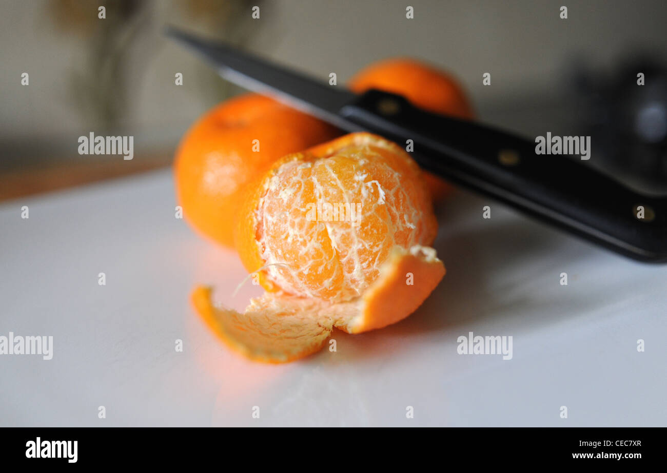 Peeled skin off a satsuma fruit rich in vitamin C for good health Stock Photo Alamy