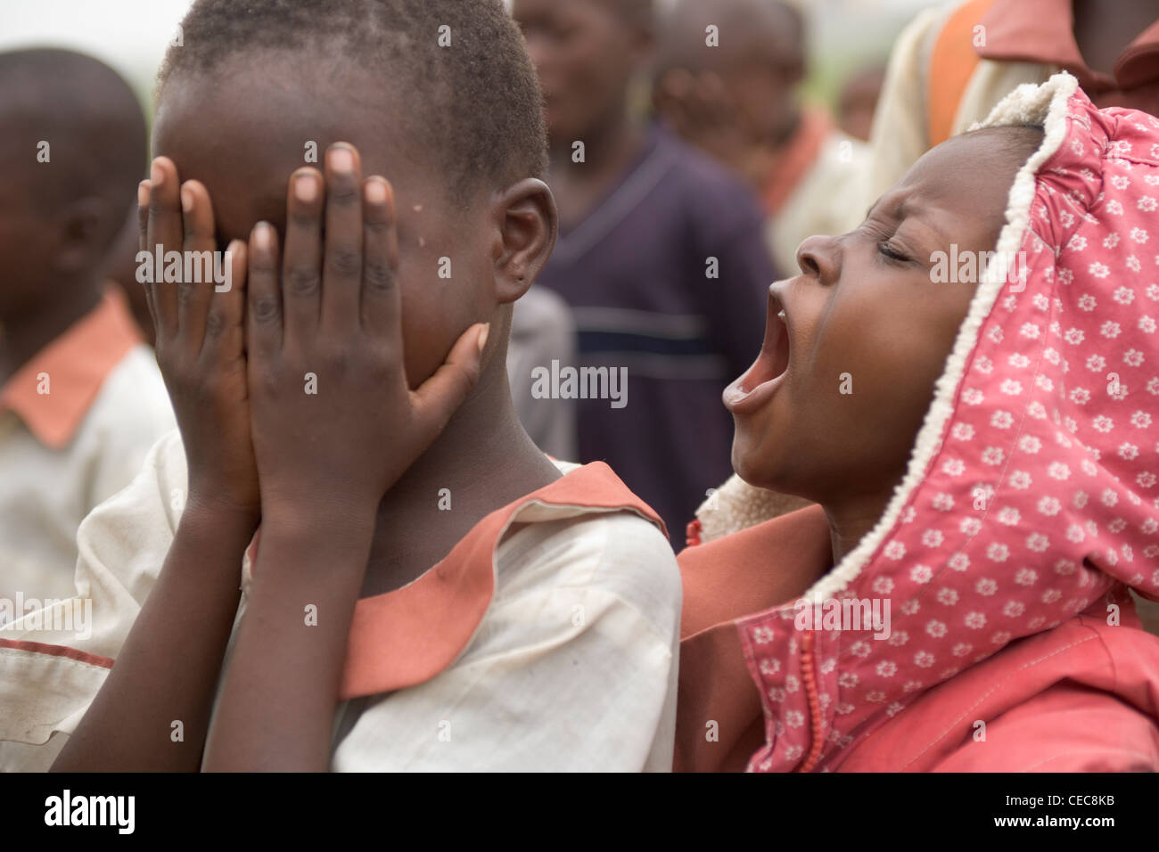Children praying during morning assembley, primary school, Lagos Nigeria Stock Photo