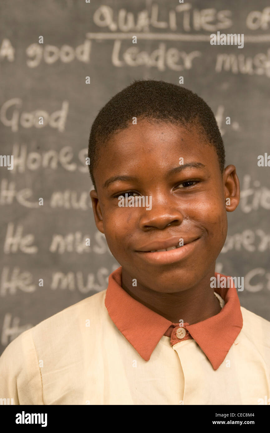 Joshua Ezekiel in front of blackboard during English class, primary school, Lagos, Nigeria Stock Photo