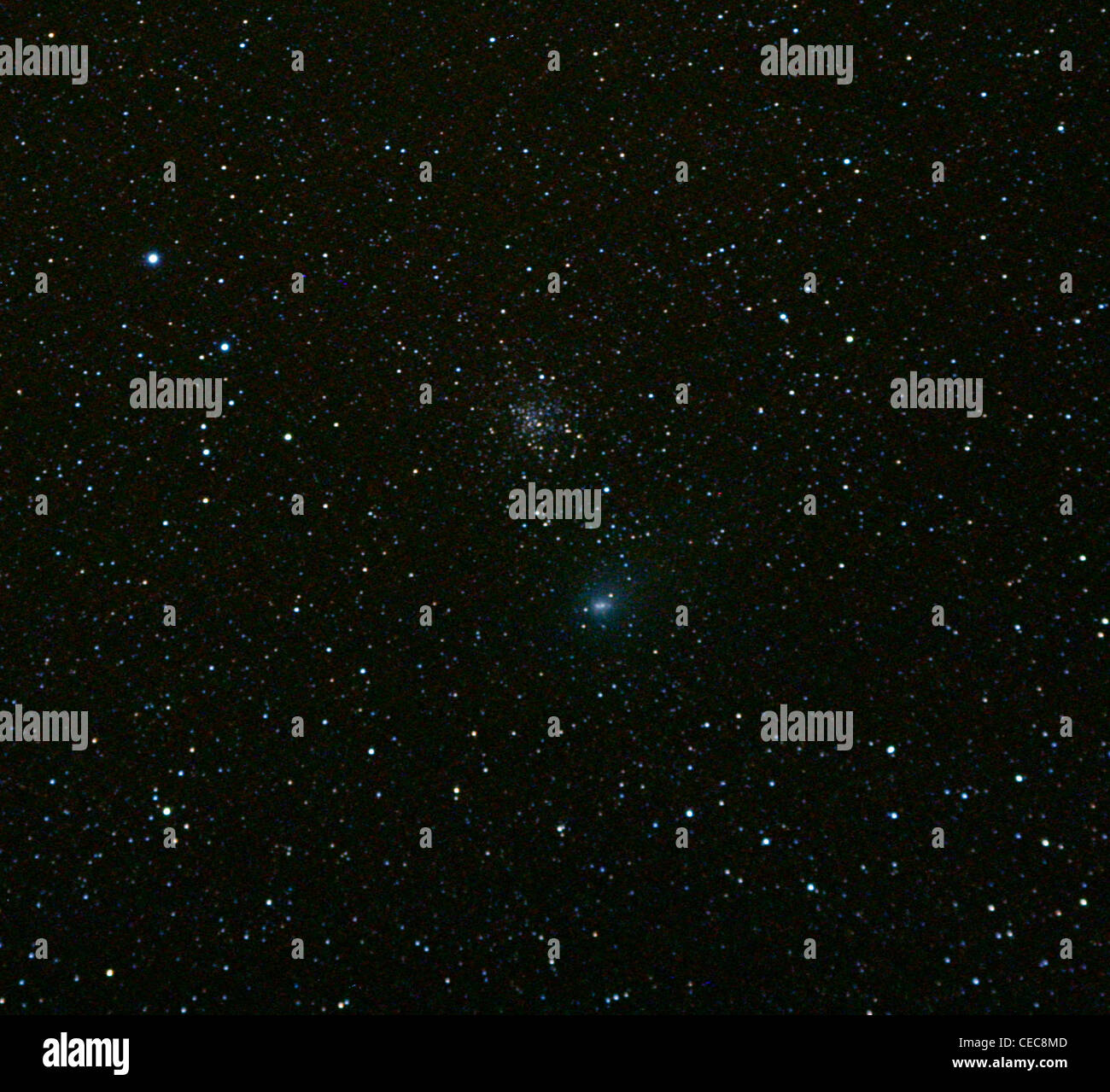 Comet Garradd and globular cluster M71, photographed with 80 mm refractor Stock Photo