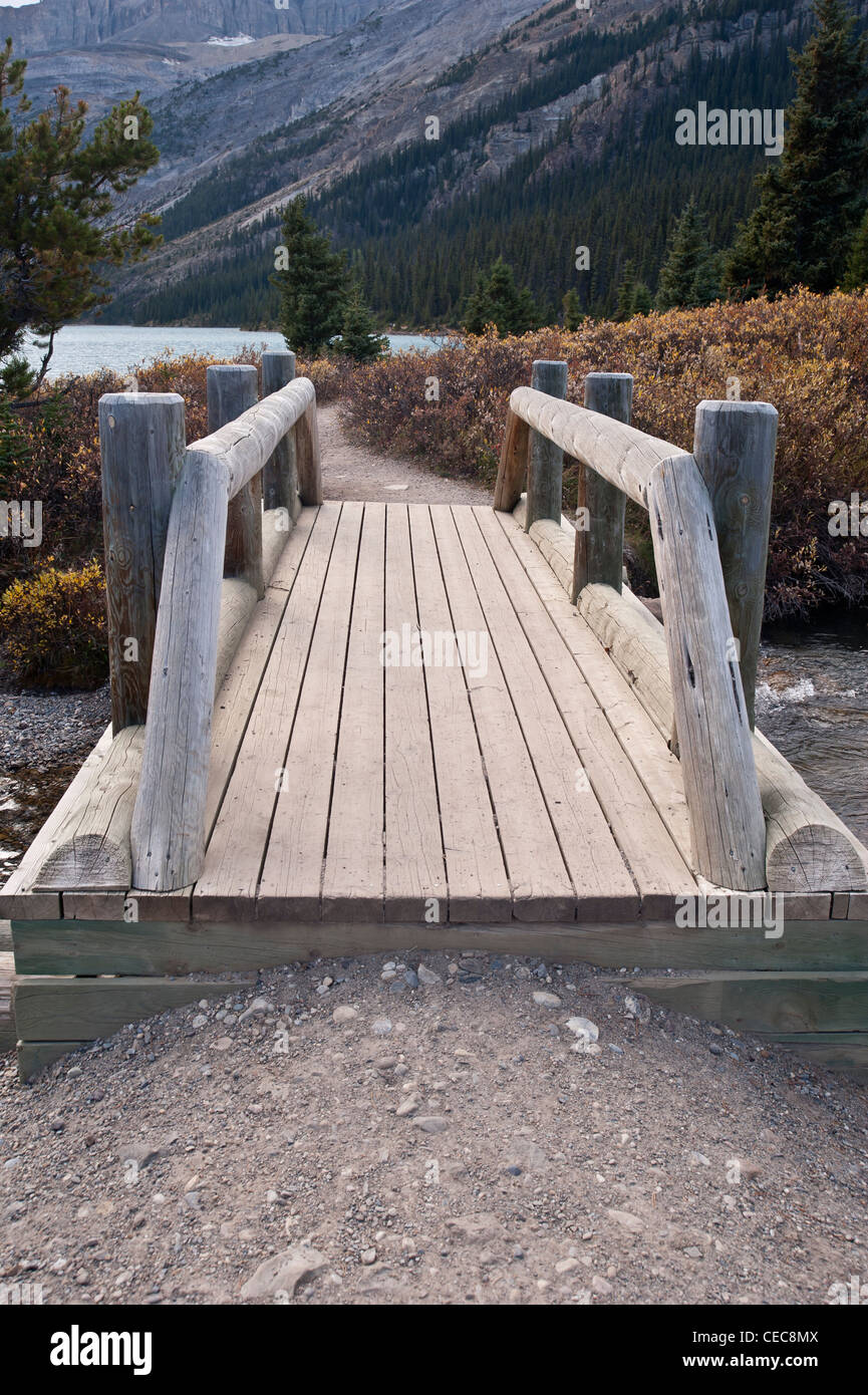 Bridge leading to the trail at the back of Bow Lake, Icefields Parkway, Alberta, Canada. Stock Photo