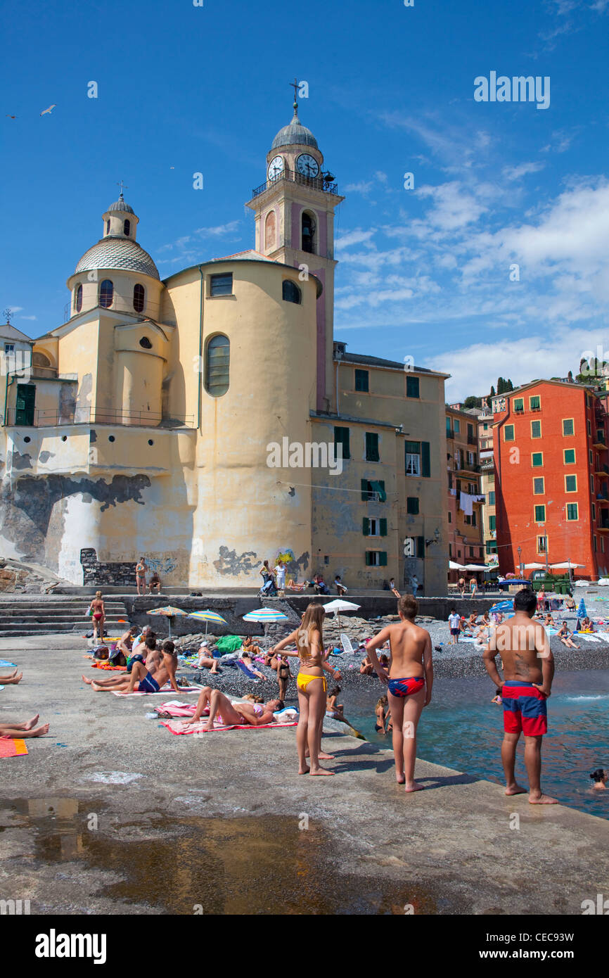 People at the beach, church Santa Maria Assunta Basillica, Camogli, Provinz Genua, Liguria, Levante, Italy, Mediterranean sea, Europe Stock Photo