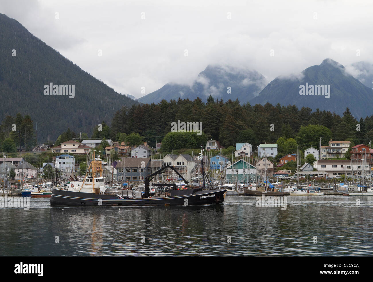 View of waterfront with black boat in Sitka, Alaska, USA Stock Photo