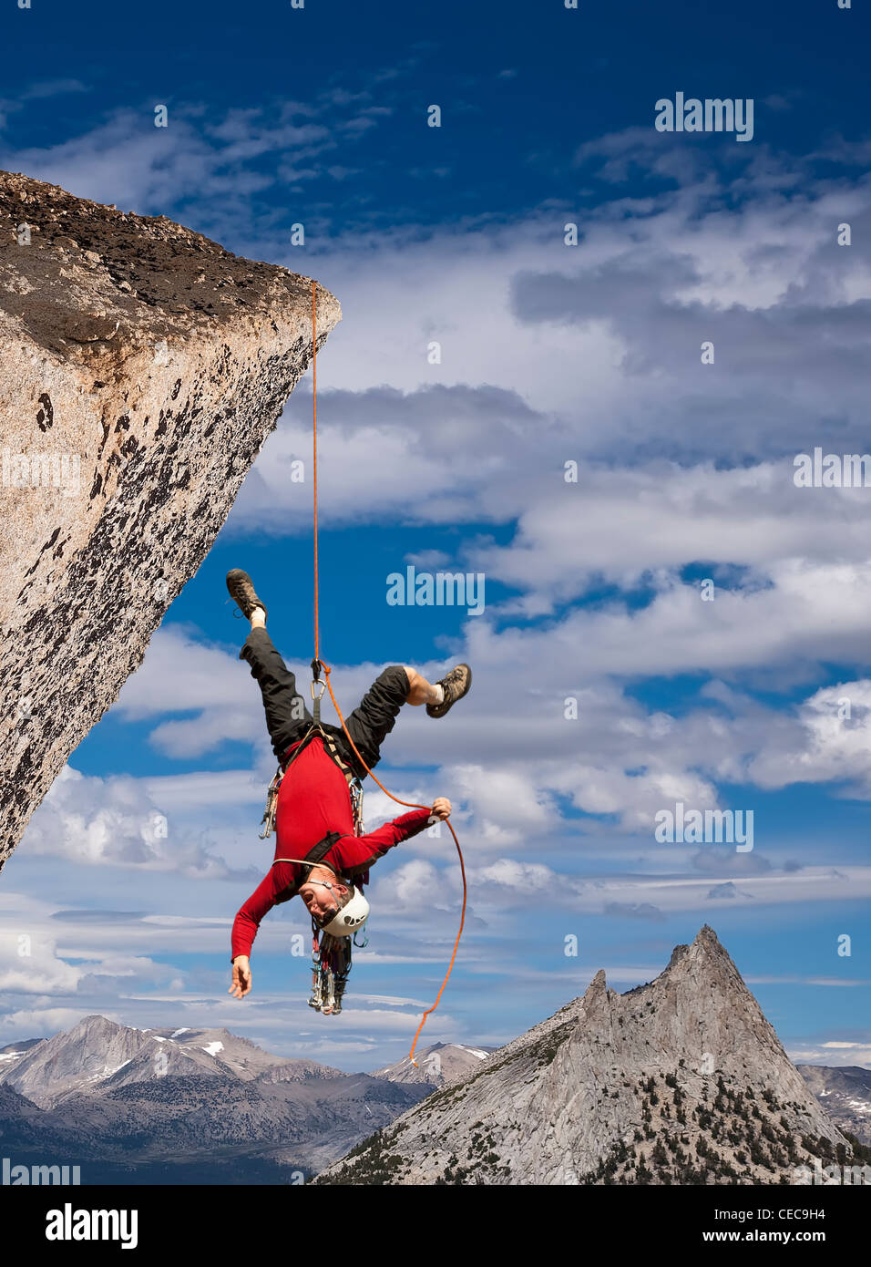 Climber in trouble at the end of his rope Stock Photo - Alamy