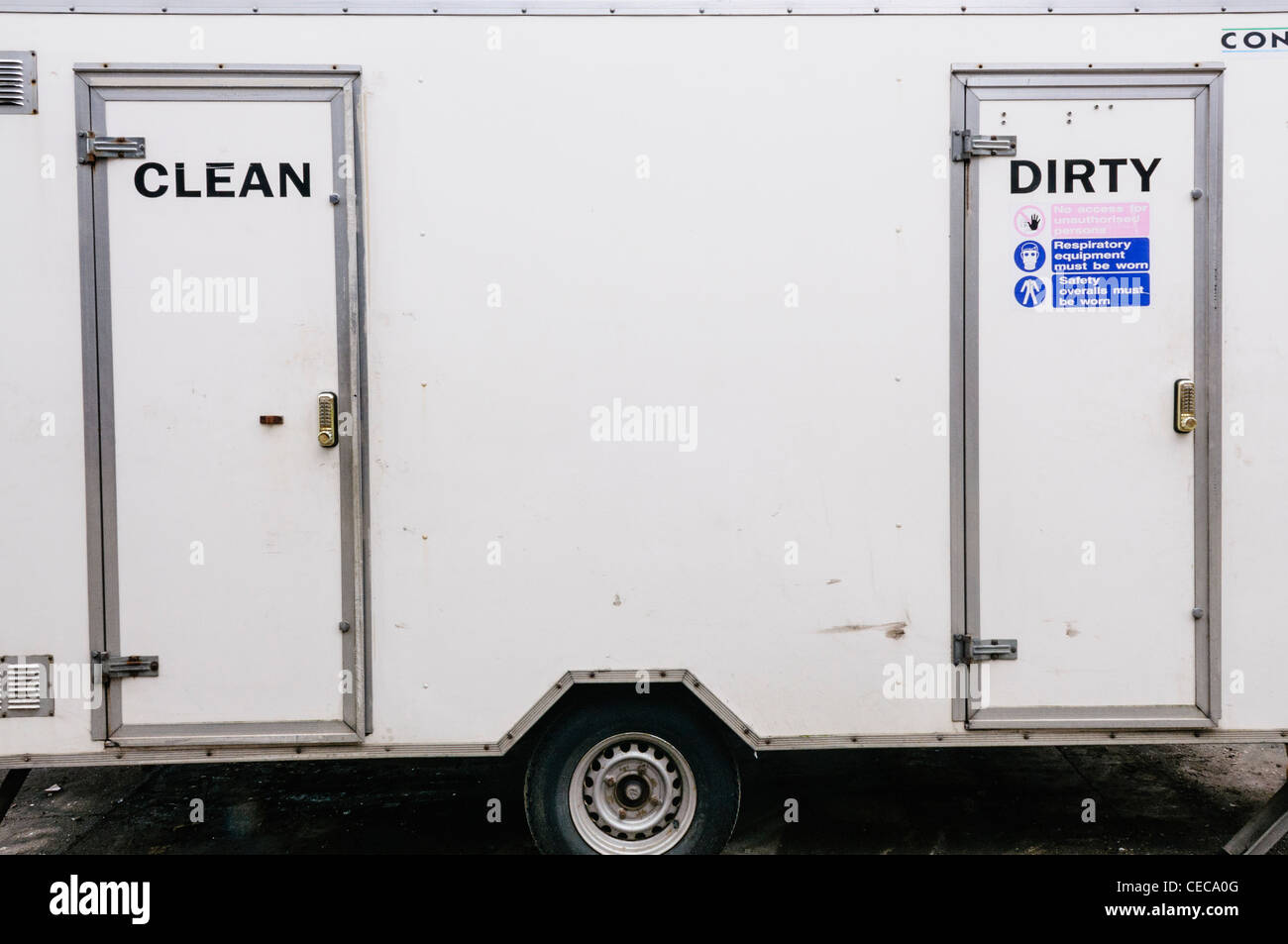 Asbestos cleanup clean and dirty portable shower unit Stock Photo Alamy