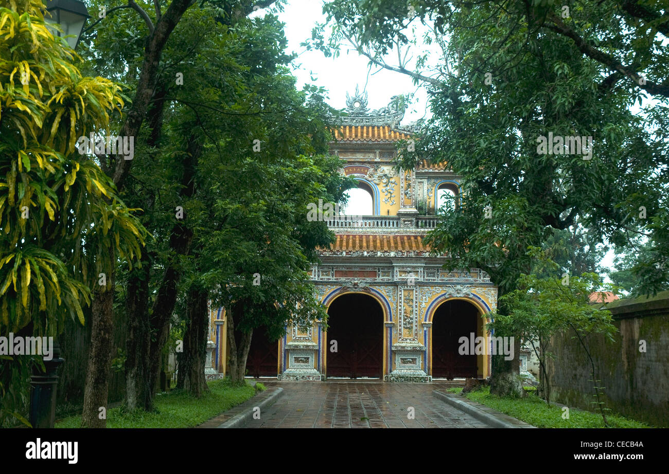 An elegant building stands half hidden in a corner of  Vietnam's royal Citadel in Hué Stock Photo