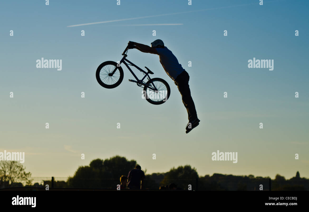 this is a superman trick realized with a bmx at the location called draveil  in france 91210 Stock Photo - Alamy