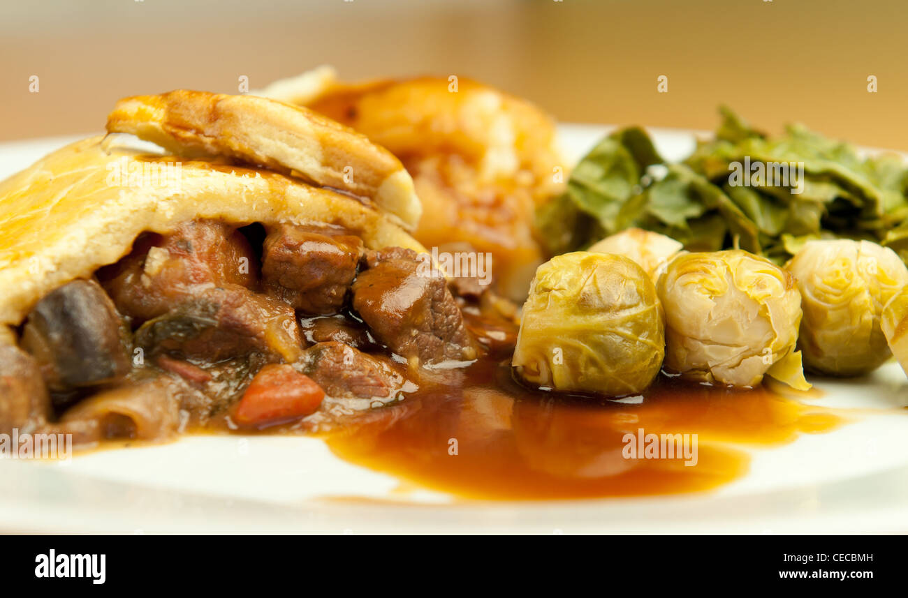 Meat pie with all the trimmings Stock Photo