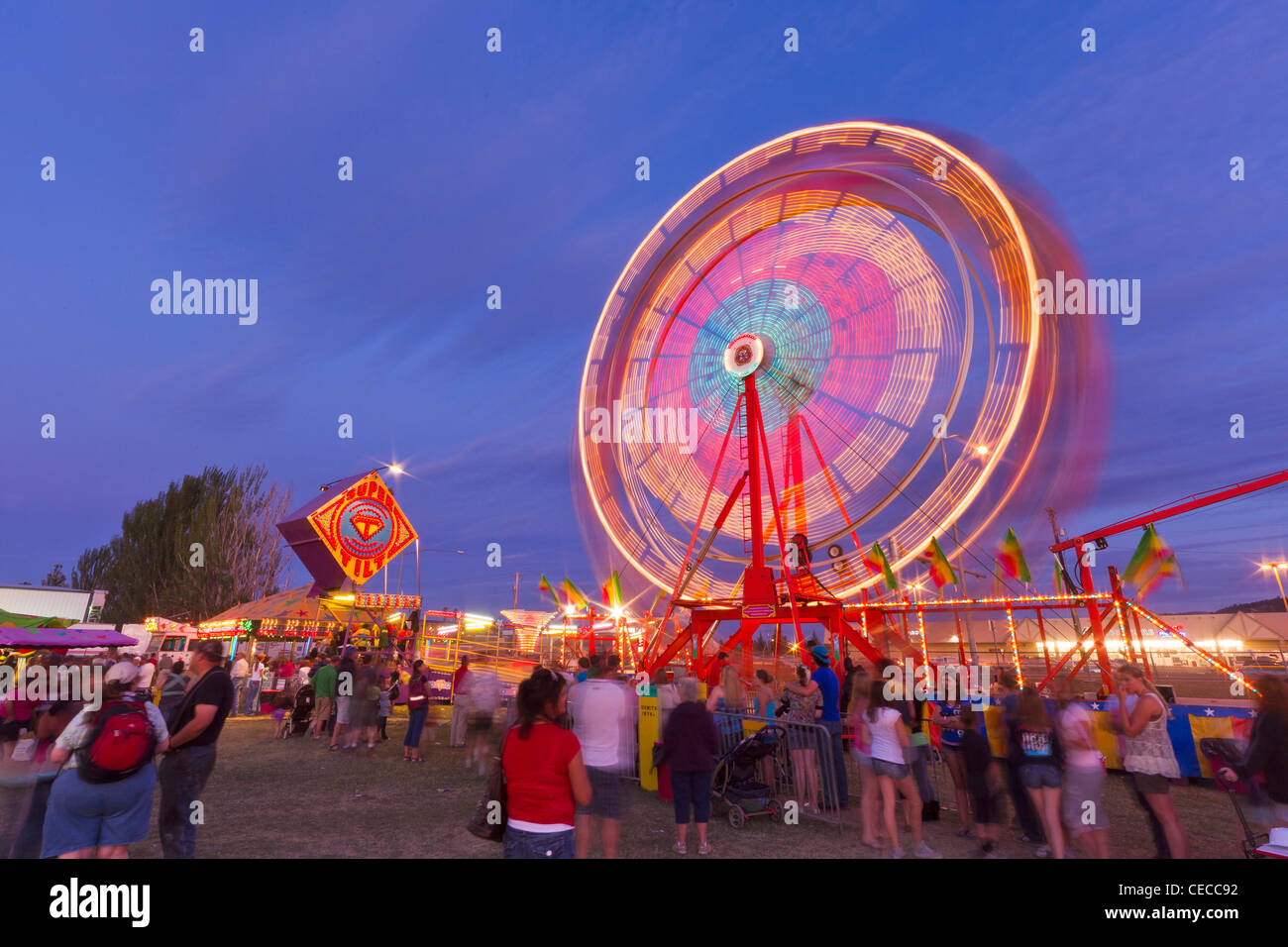 Carnival rides at dusk hires stock photography and images Alamy