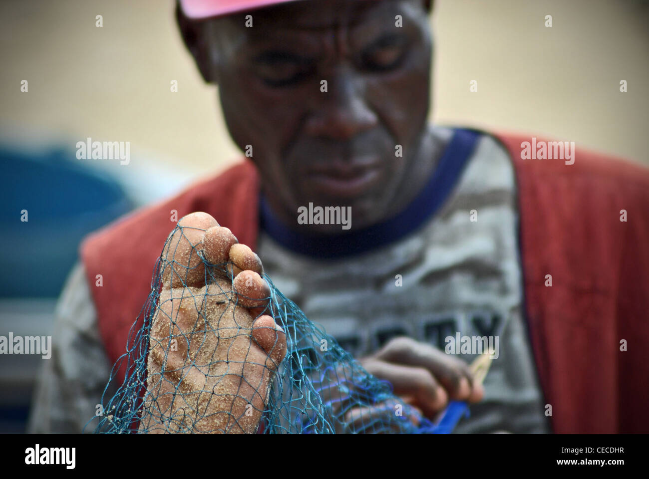 Nets weaving fisherman hi-res stock photography and images - Alamy