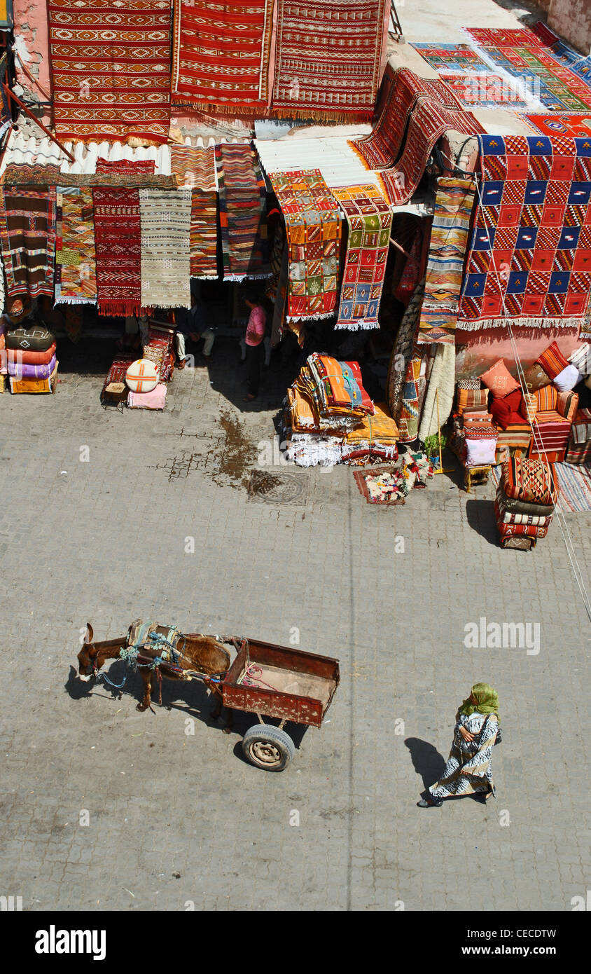 Donkey cart and rug shop in Marrakesh, Morocco Stock Photo