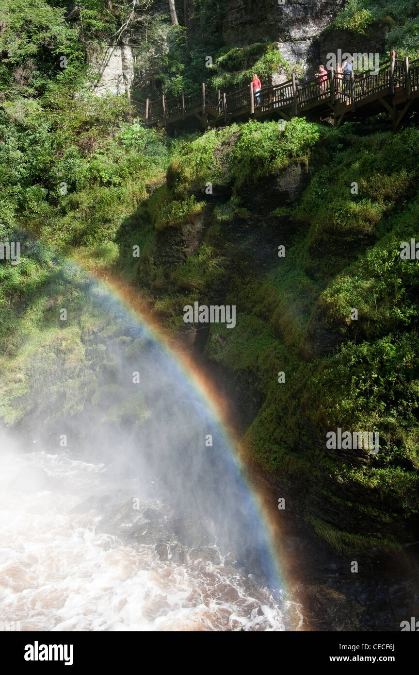 Rainbow in waterfall spray at Bushkill main falls in the Poconos near the Delaware Water Gap, Pennsylvania. Stock Photo