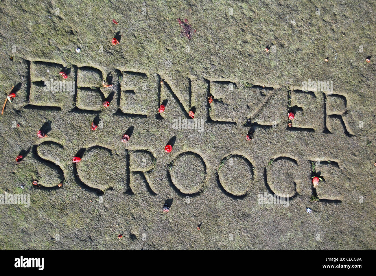 grave stone of ebenezer scrooge Stock Photo
