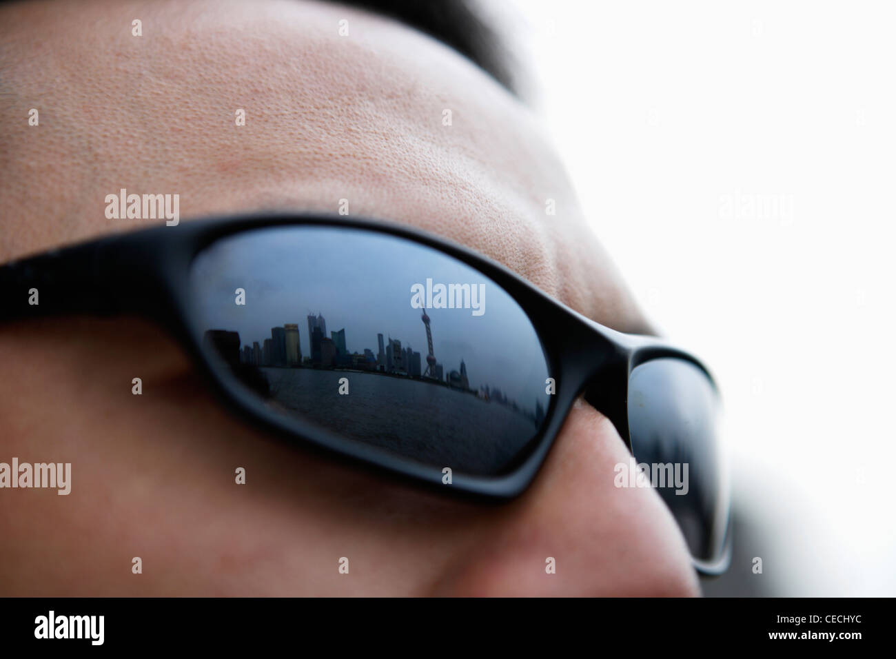 Shanghai skyline reflected in sunglasses. Stock Photo